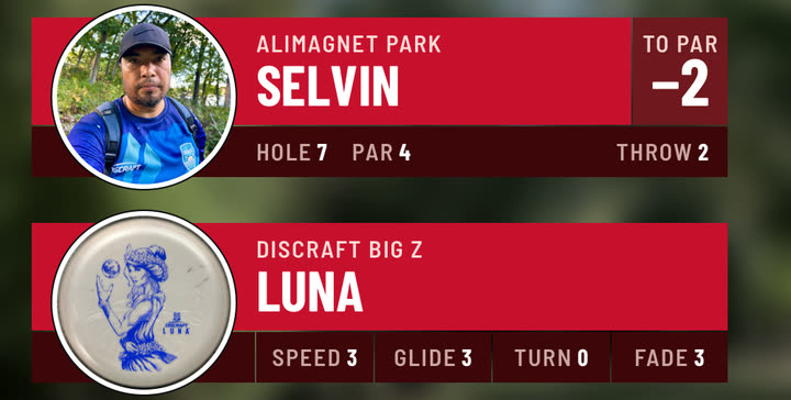 The throw overlay with Selvin’s photo and the disc overlay with a photo of a white Big Z Luna, both as round die-cut stickers, in Red, over blurred footage from Alimagnet Park.
